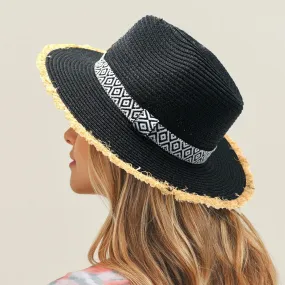 BLACK STRAW PANAMA HAT WITH BLACK AND WHITE AZTEC BAND AND FRAYED EDGES